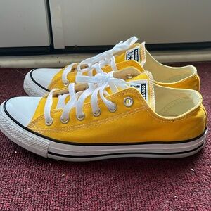 Yellow converse. Worn once. Woman’s 9 1/2 men’s 7 1/2